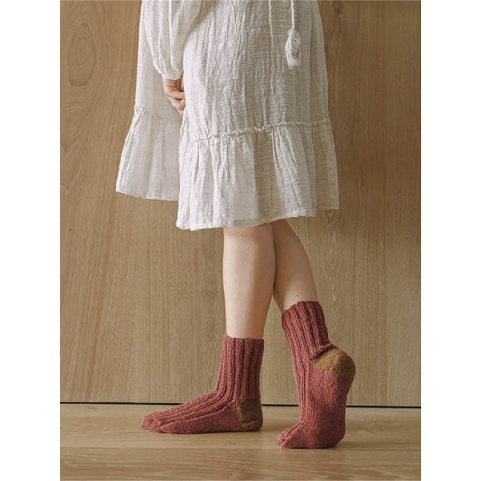 Anleitung (de, en) von © Sandnes - Socken Theme 64 / Nr. 7