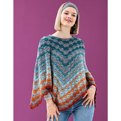 Anleitung (de) von © Woolly Hugs  - Poncho Dilara- Maschenwelt 04/25