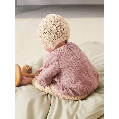 Anleitung (de, en) von © Sandnes - Colette Tights og Kyse 2106 Summer Baby / Nr. 10