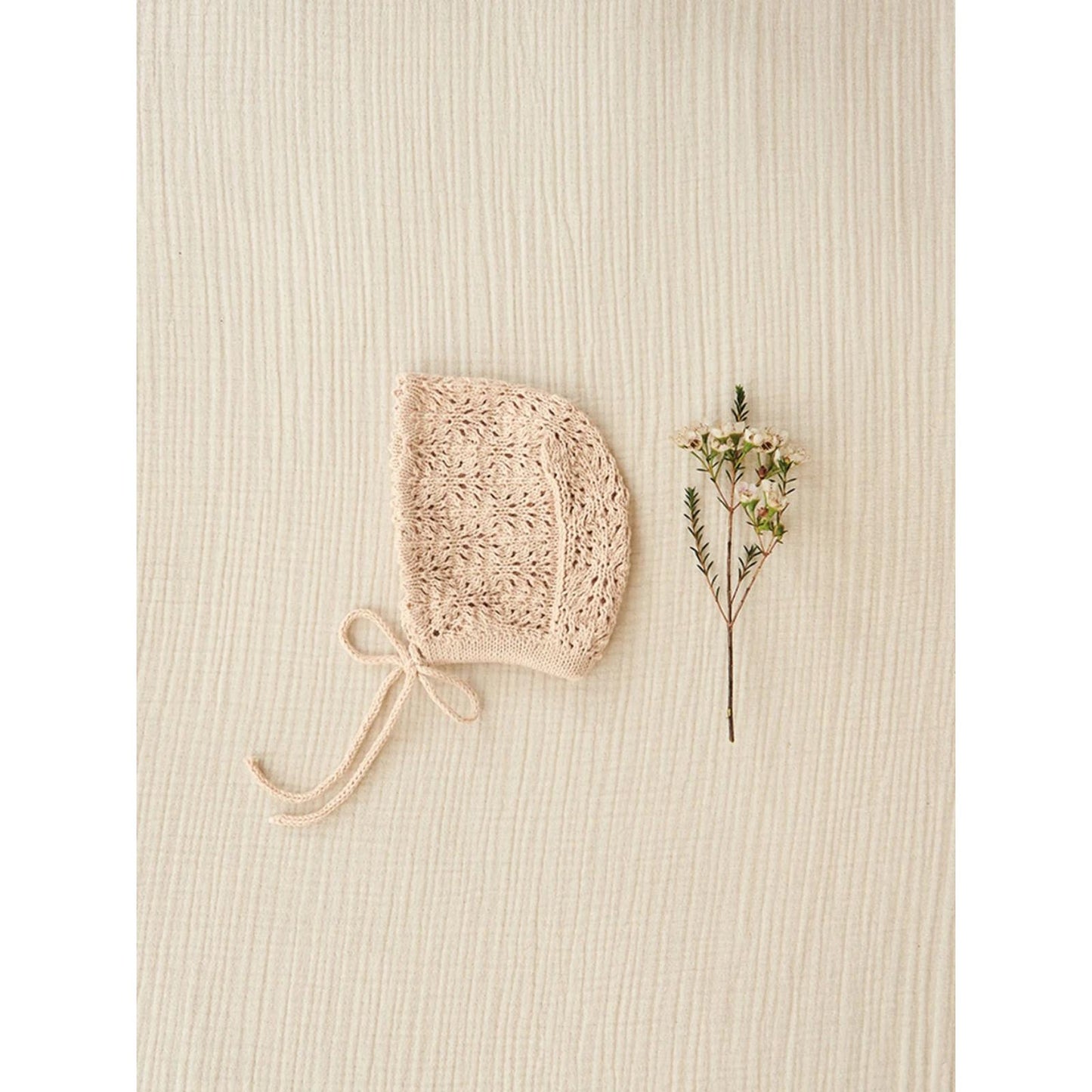 Anleitung (de, en) von © Sandnes - Colette Tights og Kyse 2106 Summer Baby / Nr. 10